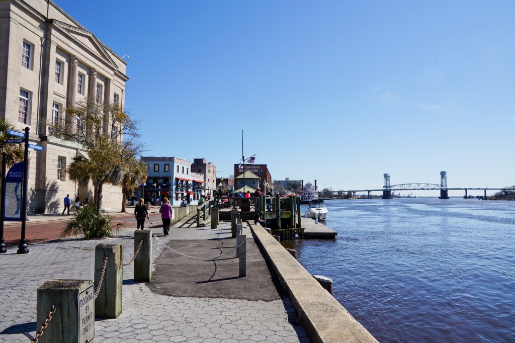 Cape Fear Riverfront with bridge and shops in Wilmington