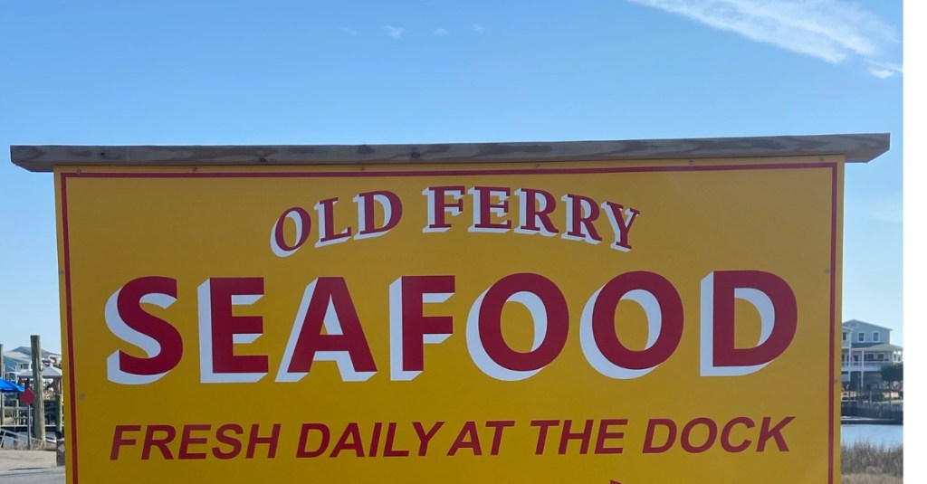 Sign for Old Ferry Seafood – Fresh Daily at the Dock in Holden Beach